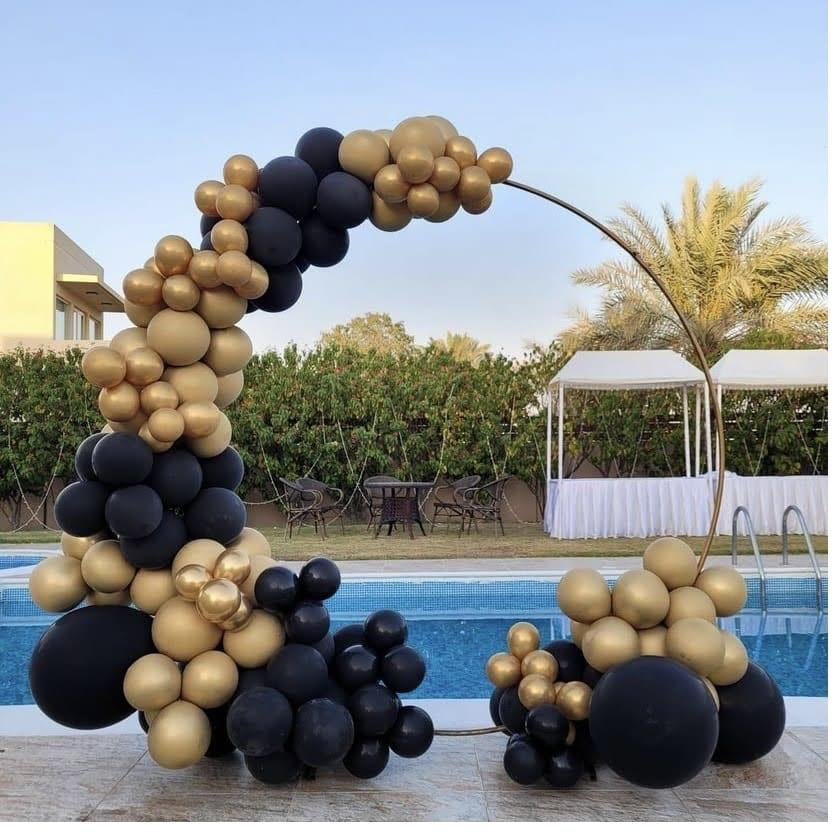 Birthday balloon arch poolside