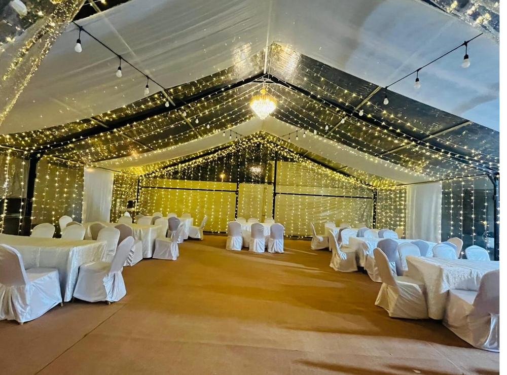 Tent interior with warm string lighting