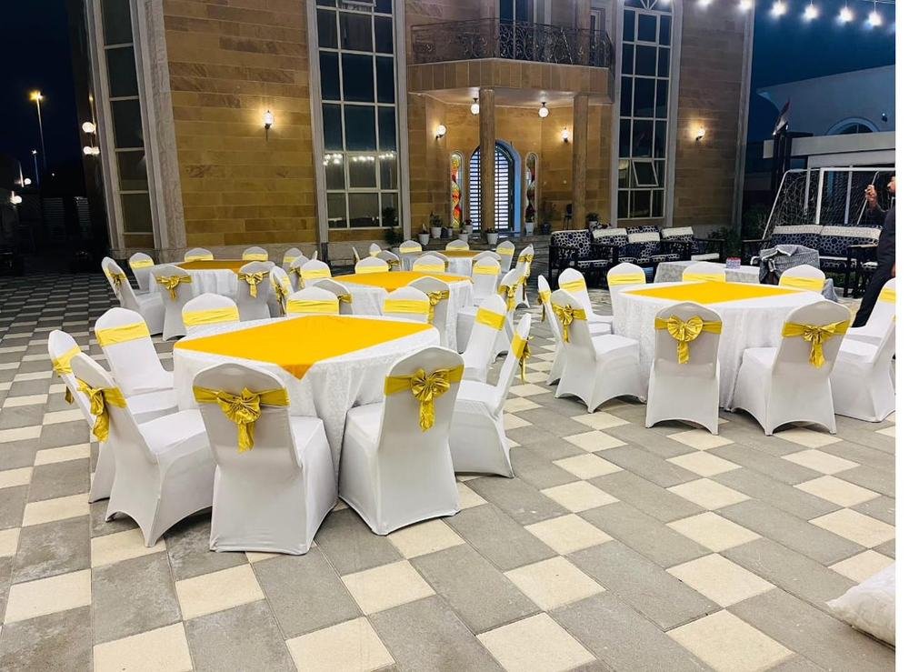 Outdoor courtyard setup with gold accents
