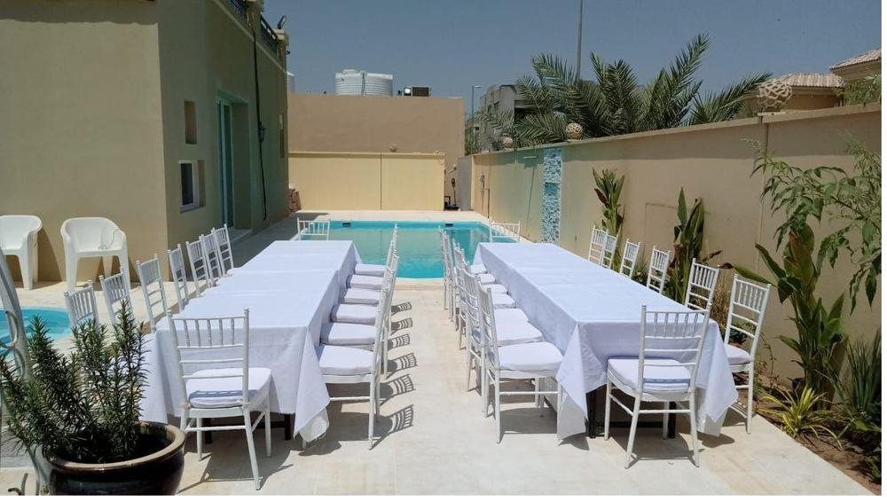 Poolside outdoor dining setup